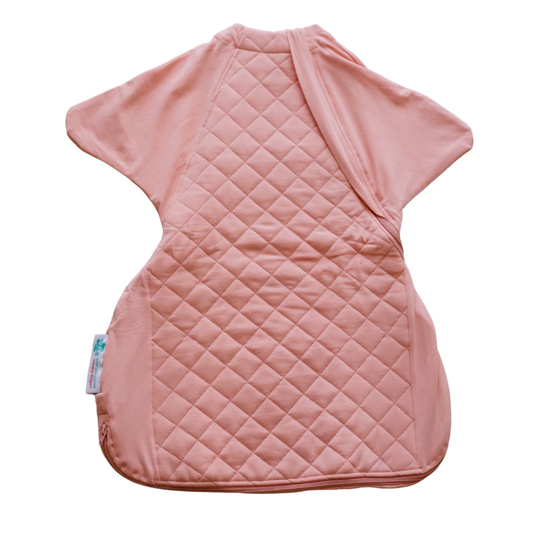 Pink quilted baby sleep sack for winter warmth