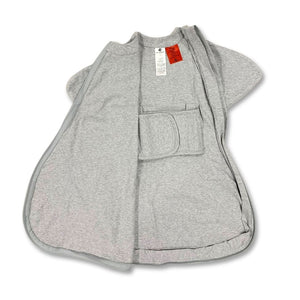Baby sleeping bag with belly band for transitioning from swaddling to free arms
