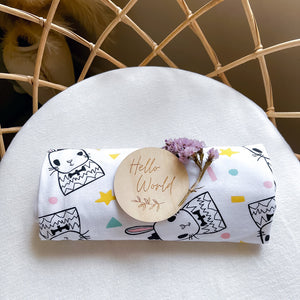 Koala Hugs newborn swaddle wrap helps calm the startle reflex and keeps babies sleeping longer.