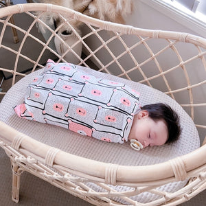 Koala Hugs newborn swaddle wrap helps calm baby's startle reflex and keeps them sleeping longer.