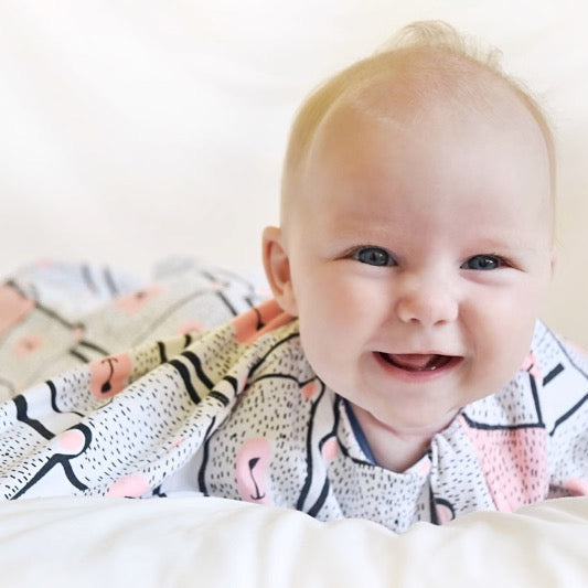 Baby sleep sack for gentle swaddle transitioning to free arms, calms the startle reflex, perfect for tummy rollers