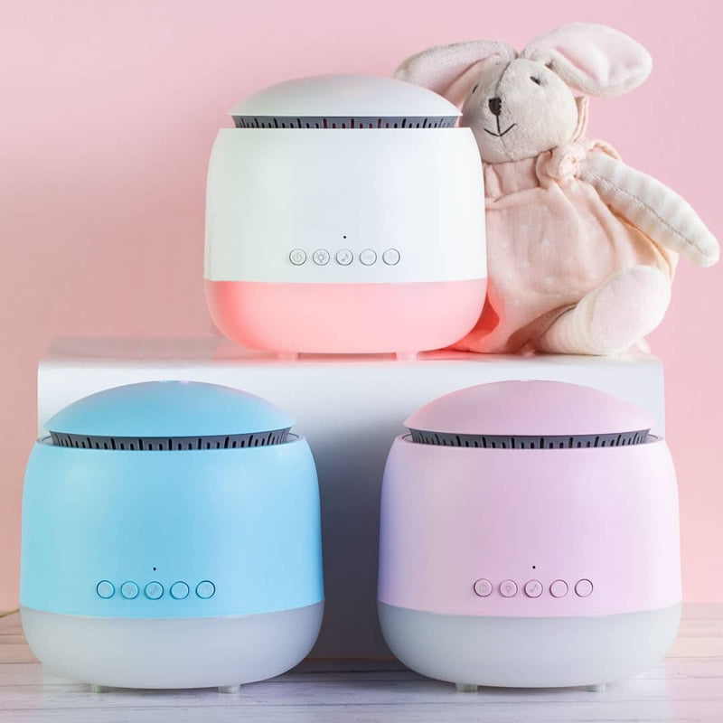 A white aroma diffuser and multi-function baby sleep aid device with control buttons.