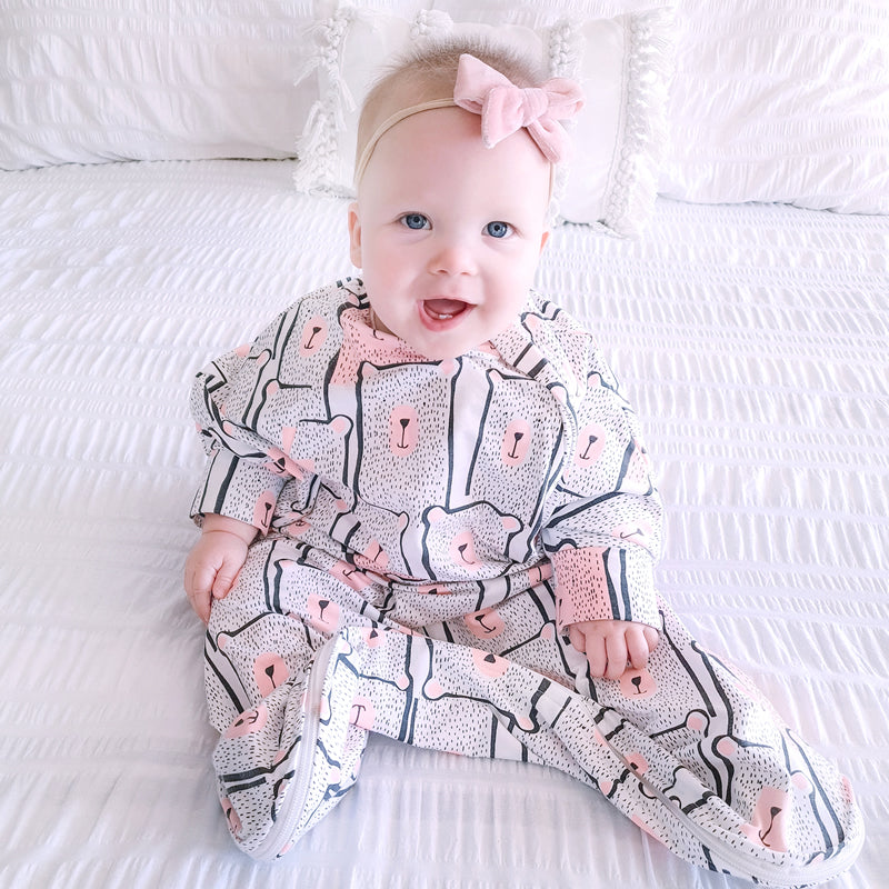 Hands out baby sleep bag with arms by Baby Loves Sleep