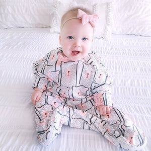 Hands out baby sleep bag with arms by Baby Loves Sleep