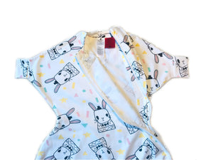 Sleepy Hugs sleep sack for gentle swaddle transitioning from swaddle to free arms, helps startle reflex for babies starting to roll