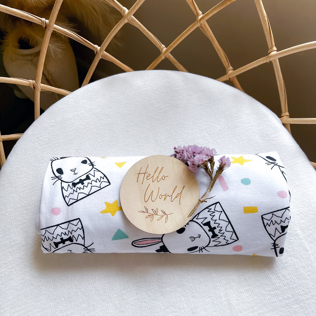 Koala Hugs newborn swaddle wrap helps calm the startle reflex and keeps babies sleeping longer.