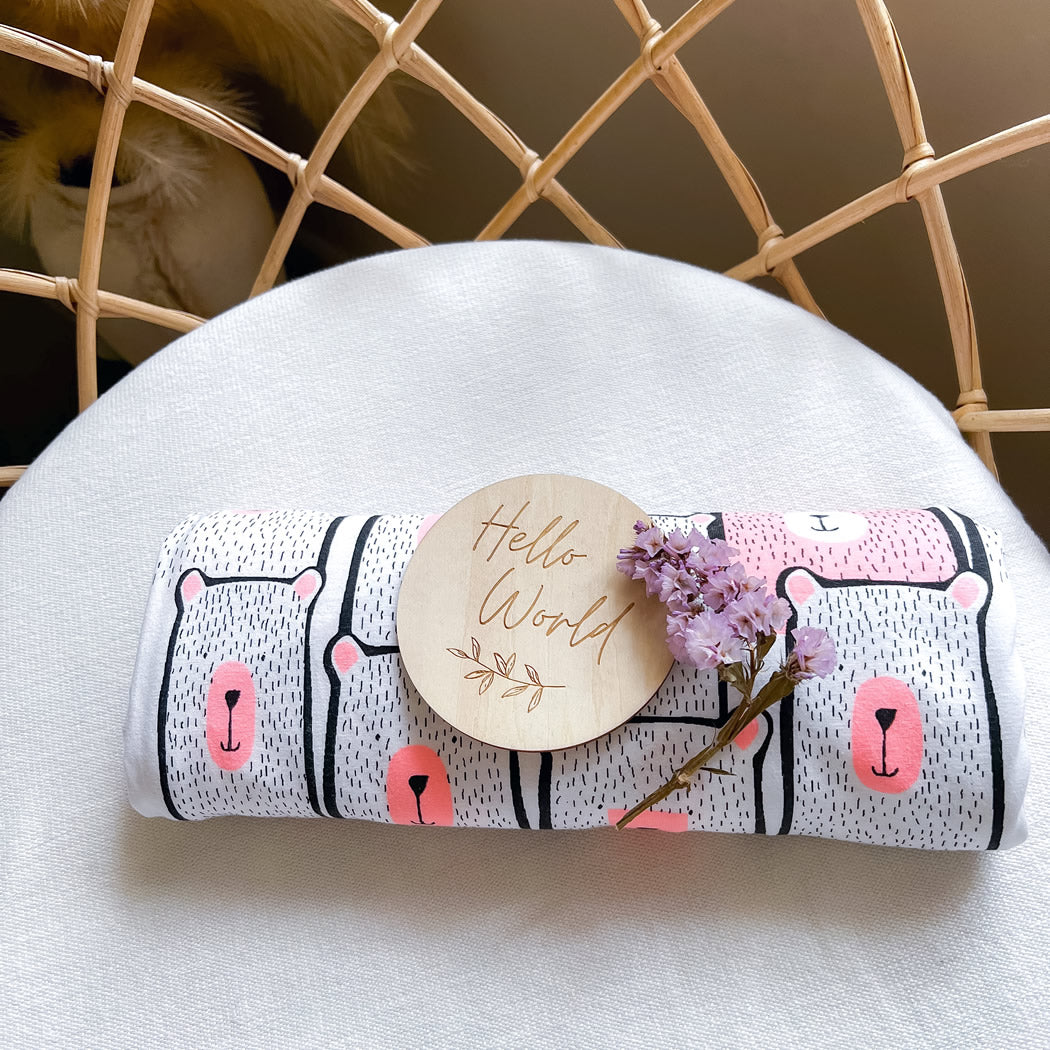 Koala Hugs newborn swaddle wrap helps calm the startle reflex and keeps babies sleeping longer.