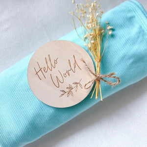 Koala Hugs newborn swaddle wrap gently cocoons baby's arms to help calm the startle reflex.