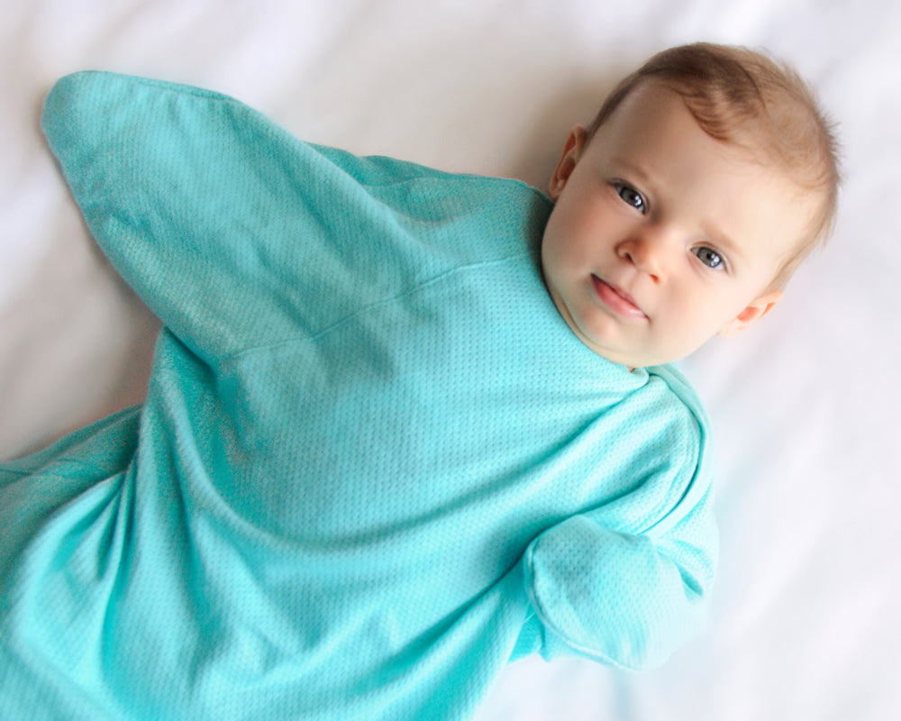 Sleepy Hugs, sleeping baby, swaddle transition, baby loves sleep, startle reflex, sleep sack, baby wearable blanket, baby blanket, swaddle sack