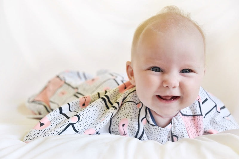 Baby sleep sack for gentle swaddle transitioning to free arms, calms the startle reflex, perfect for tummy rollers