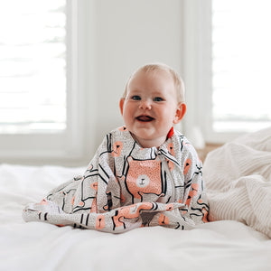 Sleepy Hugs sleep sack for gentle swaddle transitioning to free arms, calms the startle reflex, perfect for tummy rollers